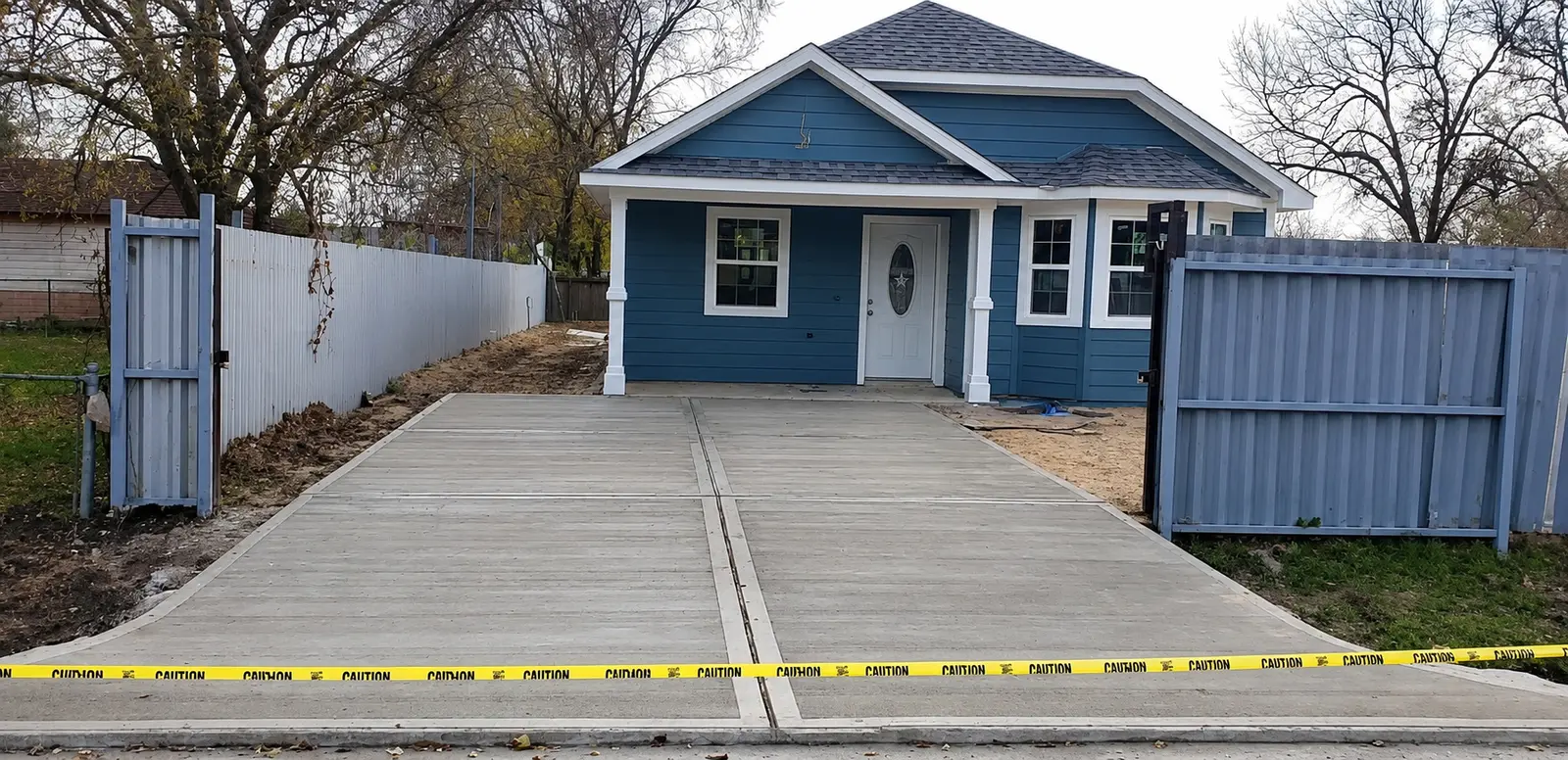 Completed concrete driveway at a Houston home