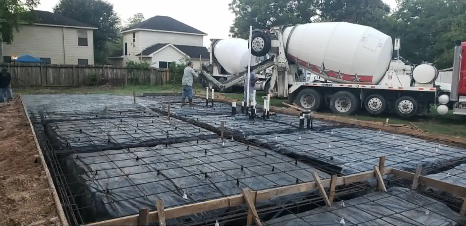 Foundation slab prepared with rebar and vapor barrier